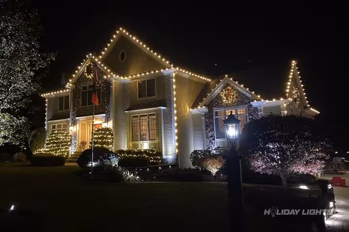 Swampscott MA home with elegant Christmas lights and holiday decorations Swampscott MA home with elegant Christmas lights and holiday decorations